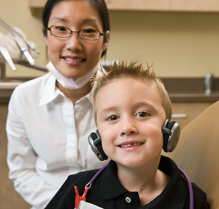 Dr. Yea with smiling patient