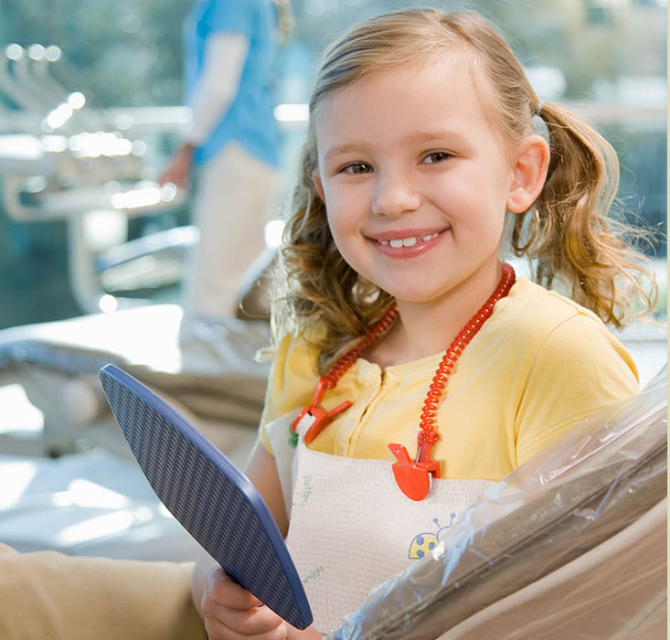 Smiling pediatric dental patient